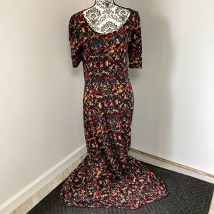 Lularoe Ana, Size M, Black background, orange, green, maroon, and blue.